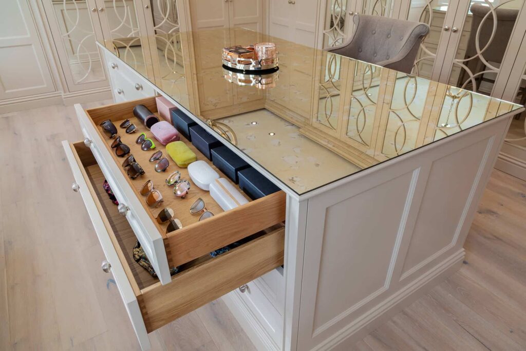A white drawer with a glass top