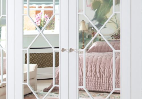 A lovely Hampton-style wardrobe for a classic feminine bedroom