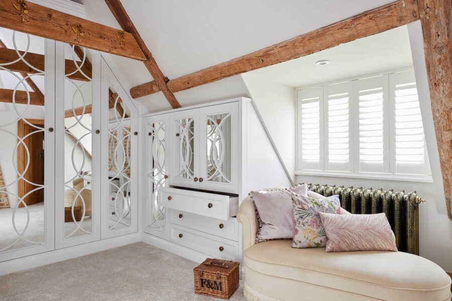 Cosy loft conversion with a wardrobe and a couch