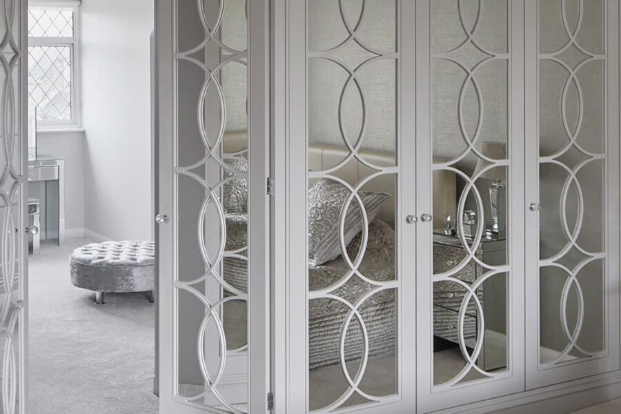 White mirrored wardrobe doors from master bedroom