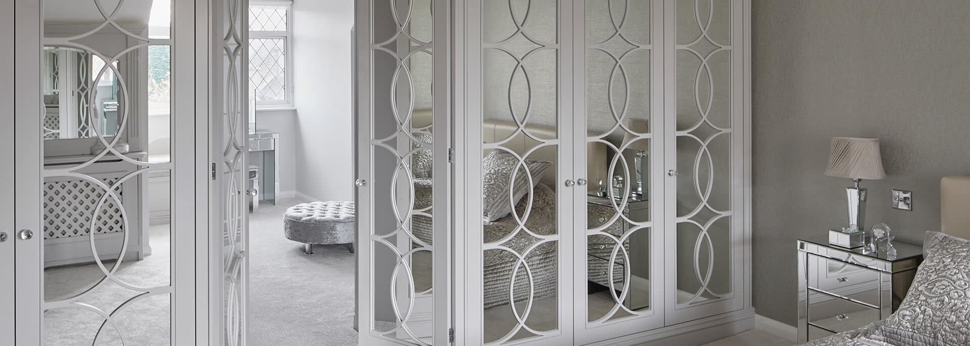 White mirrored wardrobe doors from master bedroom