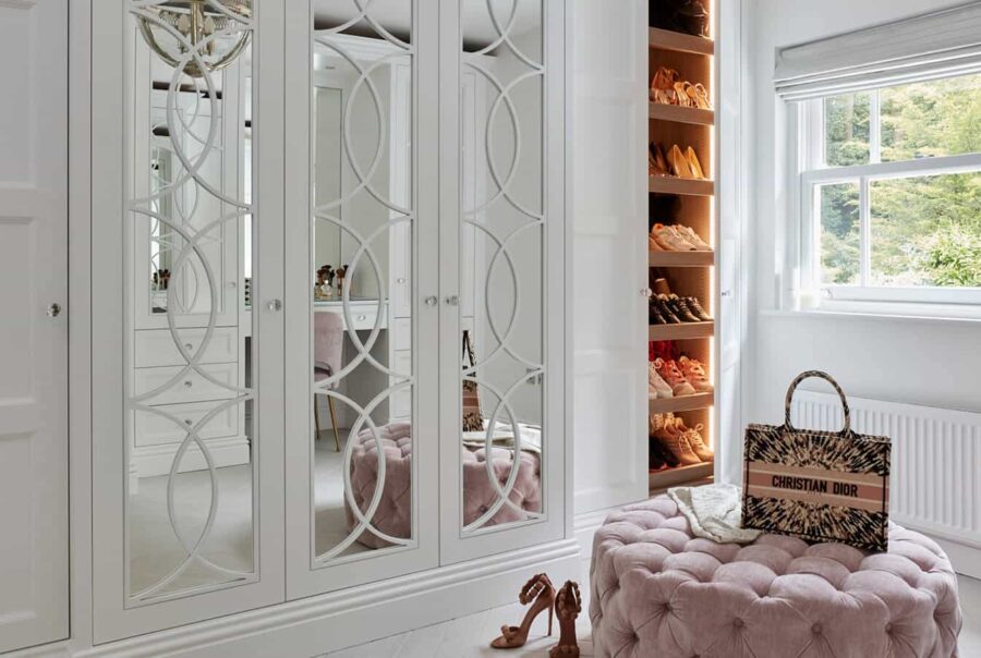 white open-ended dressing room wardrobes with mirrored doors
