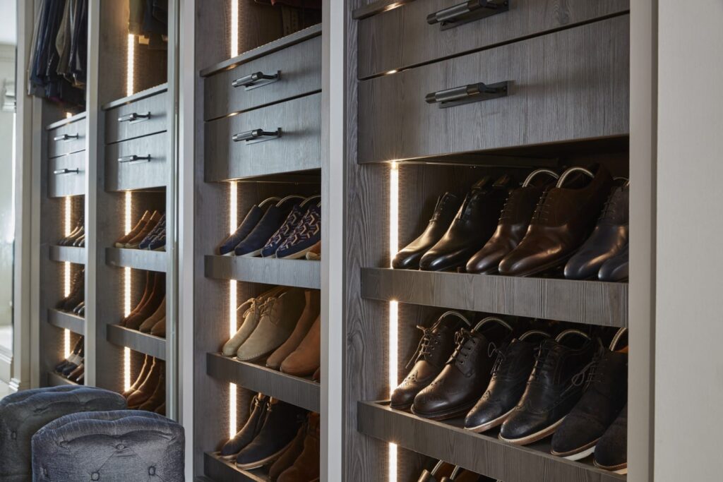 open fronted walk-in-wardrobe for men's shoes