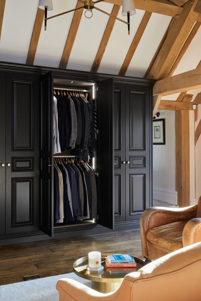 bespoke-wardrobes-tudor-003 Tudor dressing room wardrobe in dark blue with doors open