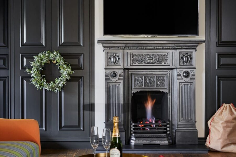 Warm and cosy atmosphere of a classic fireplace design