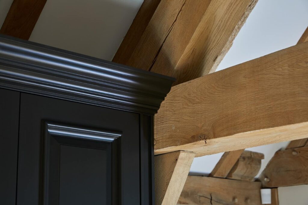 bespoke-wardrobes-tudor-009 Tudor dressing room fitted around timber beams