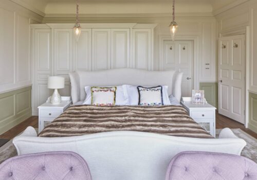 Tudor fitted wardrobe with doors closedin white