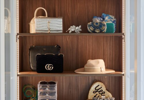 Parisian fitted wardrobes with class decorated doors open and internal lighting