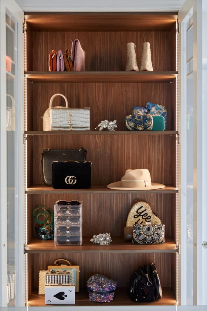 Oakdene 25 Parisian fitted wardrobes with class decorated doors open and internal lighting