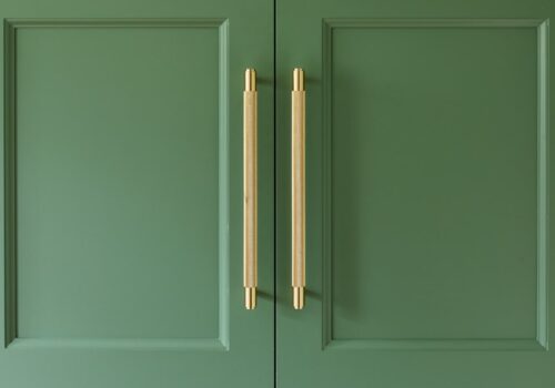 Edwardian Fitted Wardrobes in green with gold handles by The Heritage Wardrobe Company