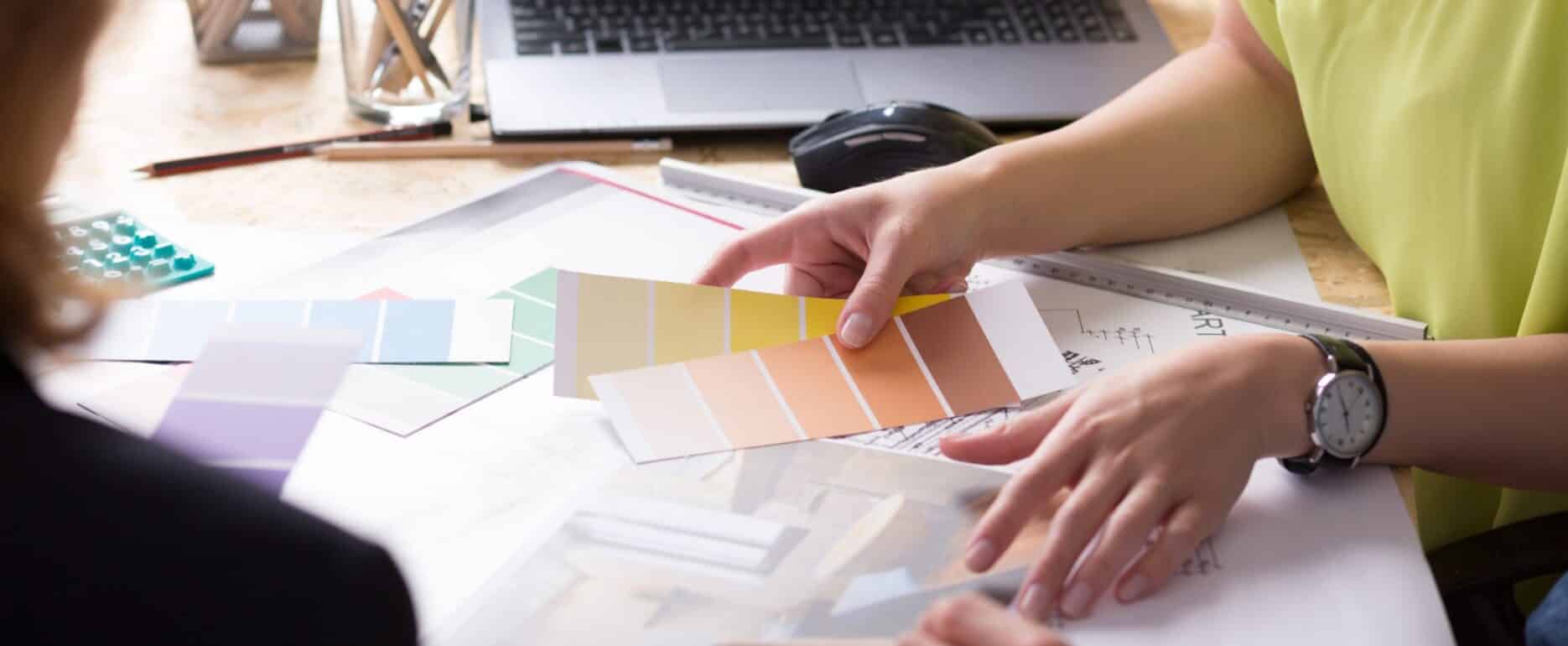 Design meeting with colour swatches and customised designs