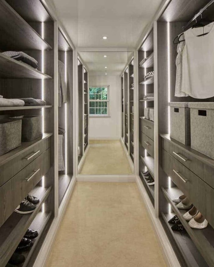 walk-in wardrobe with mirrored wall