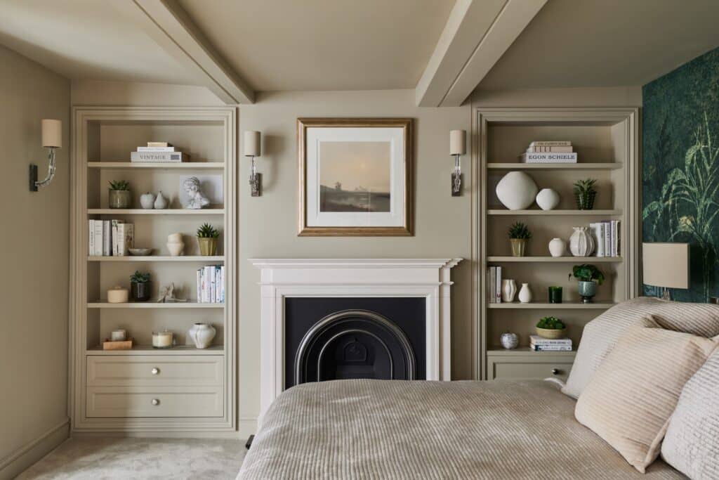 Heritage Wardrobes - Wall Hall4030-2160x1440 Matching Victorian style built-in shelving either side of fireplace in a bedroom - with light off