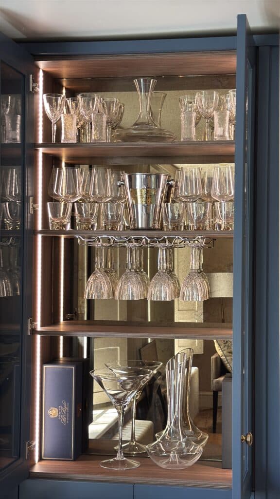 image00013 Custom made drinks cabinet with doors open, showing the LED illuminated shelves and glasses inside