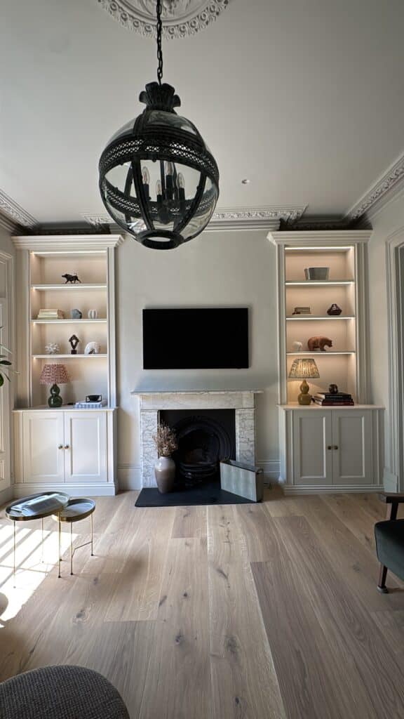 image00037 matching built in bookcases and cupboards in an alcove in the living room- made by The Heritage Wardrobe Company