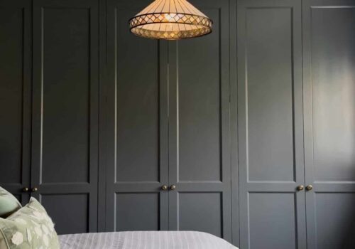 Tilford style dressing room wardrobes with hidden door (closed) that leads to ensuite bathroom