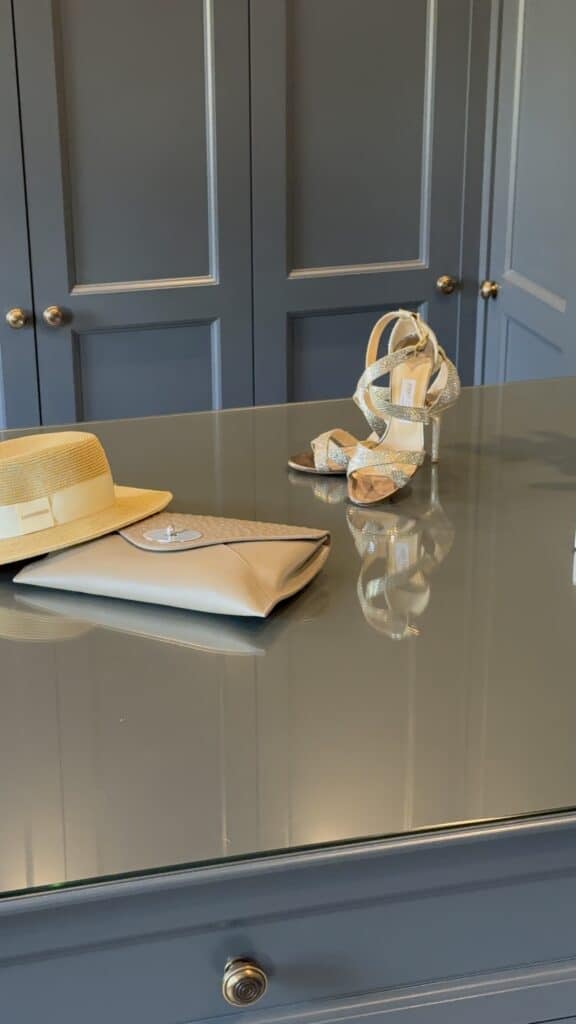 IMG_3030 Tilford style dressing room island with designer shoes on glass island surface