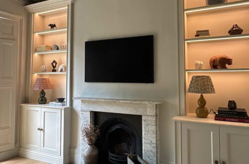 Built-in bookcases in alcove.