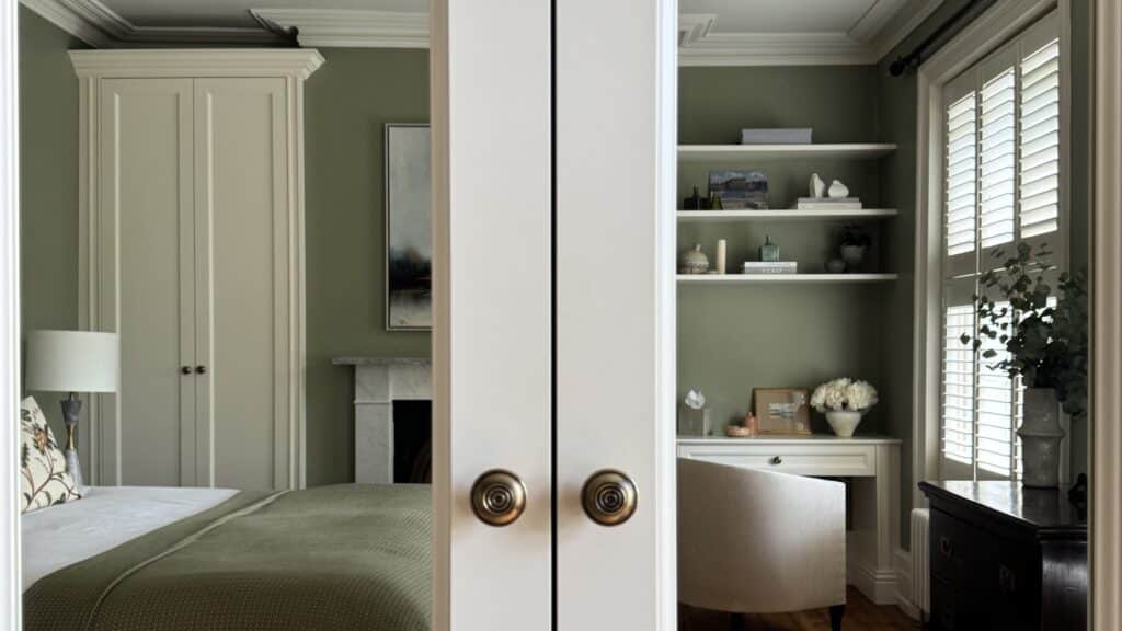 Classic style fitted wardrobe reflected in mirrored wardrobe door