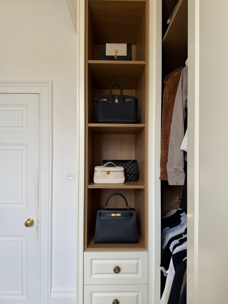 Lorna-5 open-fronted shelving displaying designer handbags