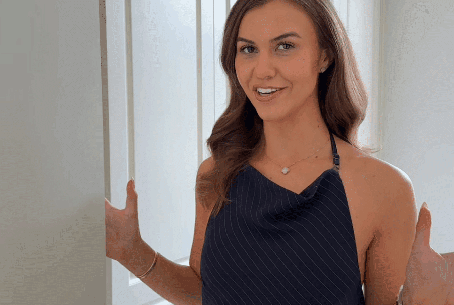 Influencer Isobel Lorna in front of her Tilford Jubilee fitted wardrobe