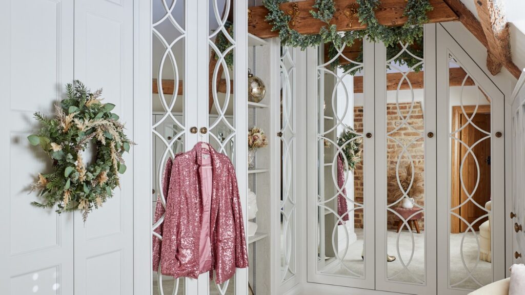 White bespoke fitted wardrobes with Christmas decorations