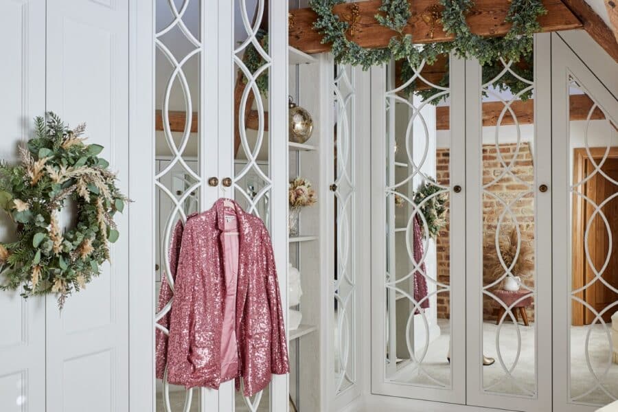 White bespoke fitted wardrobes with Christmas decorations