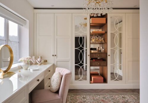 white Balmoral-style fitted wardrobe with dressing table