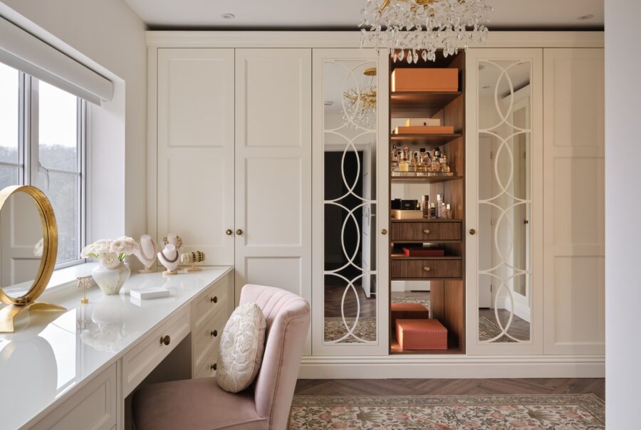 cream fitted wardrobe with bespoke dressing table.